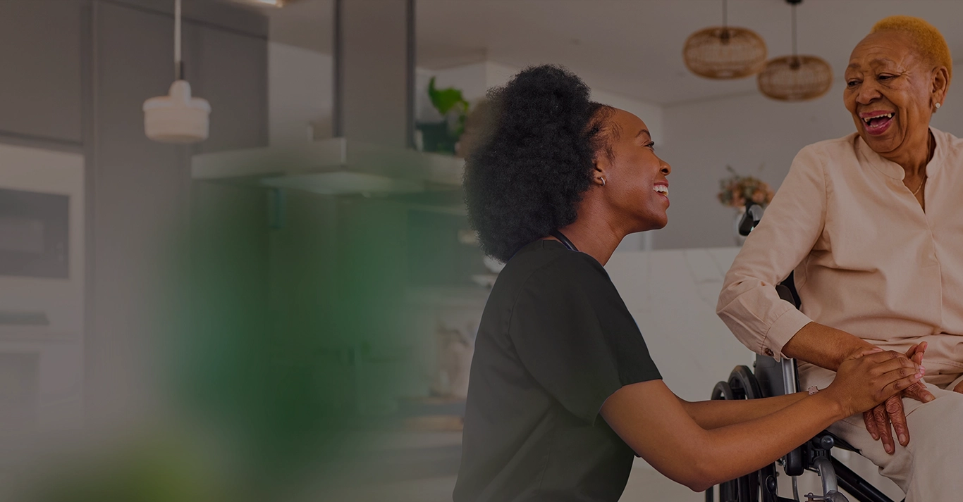 Nurse guiding a senior woman during transitional care at home