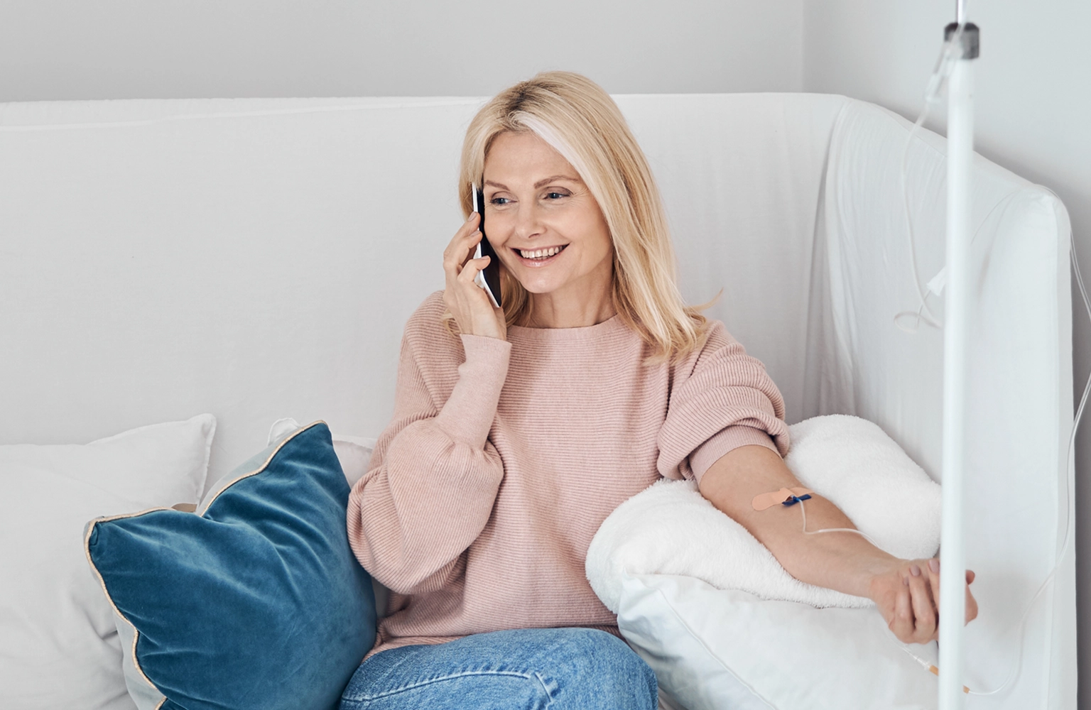 Doctor providing at-home urgent care visit to patient during home healthcare consultation