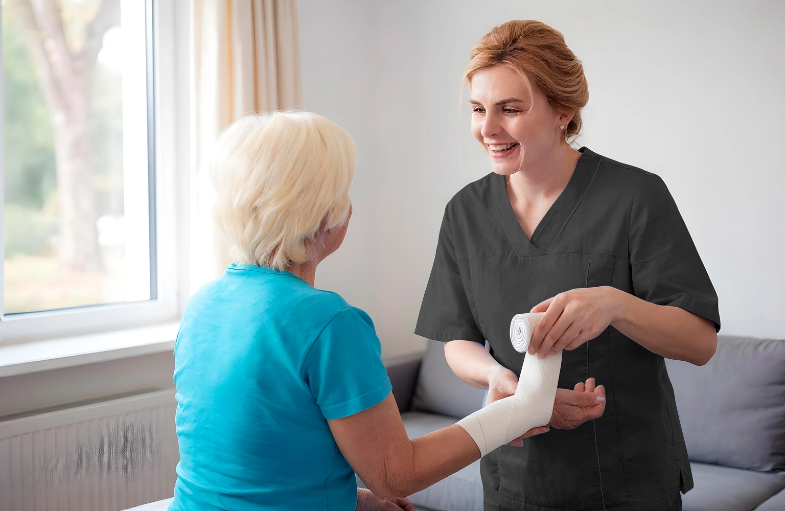 Nurse providing in-home wound care to senior patient
