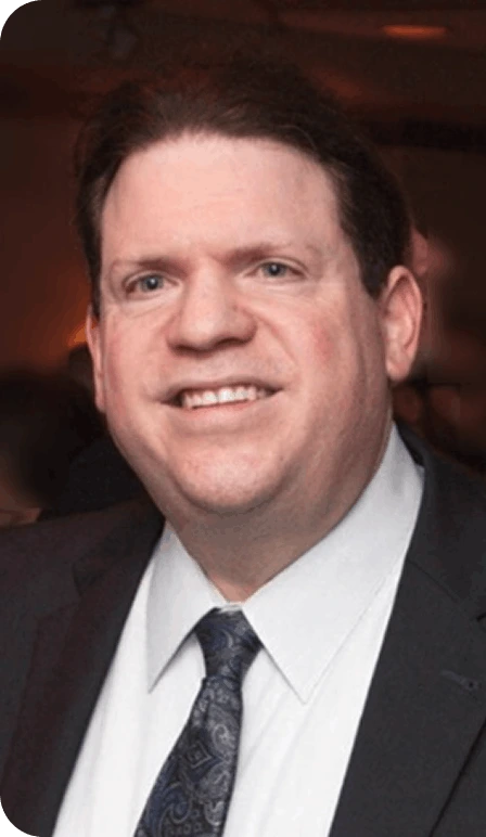 Dr. Mark Merlin, MD, Chief Medical Officer at Life Medical, in professional attire.
