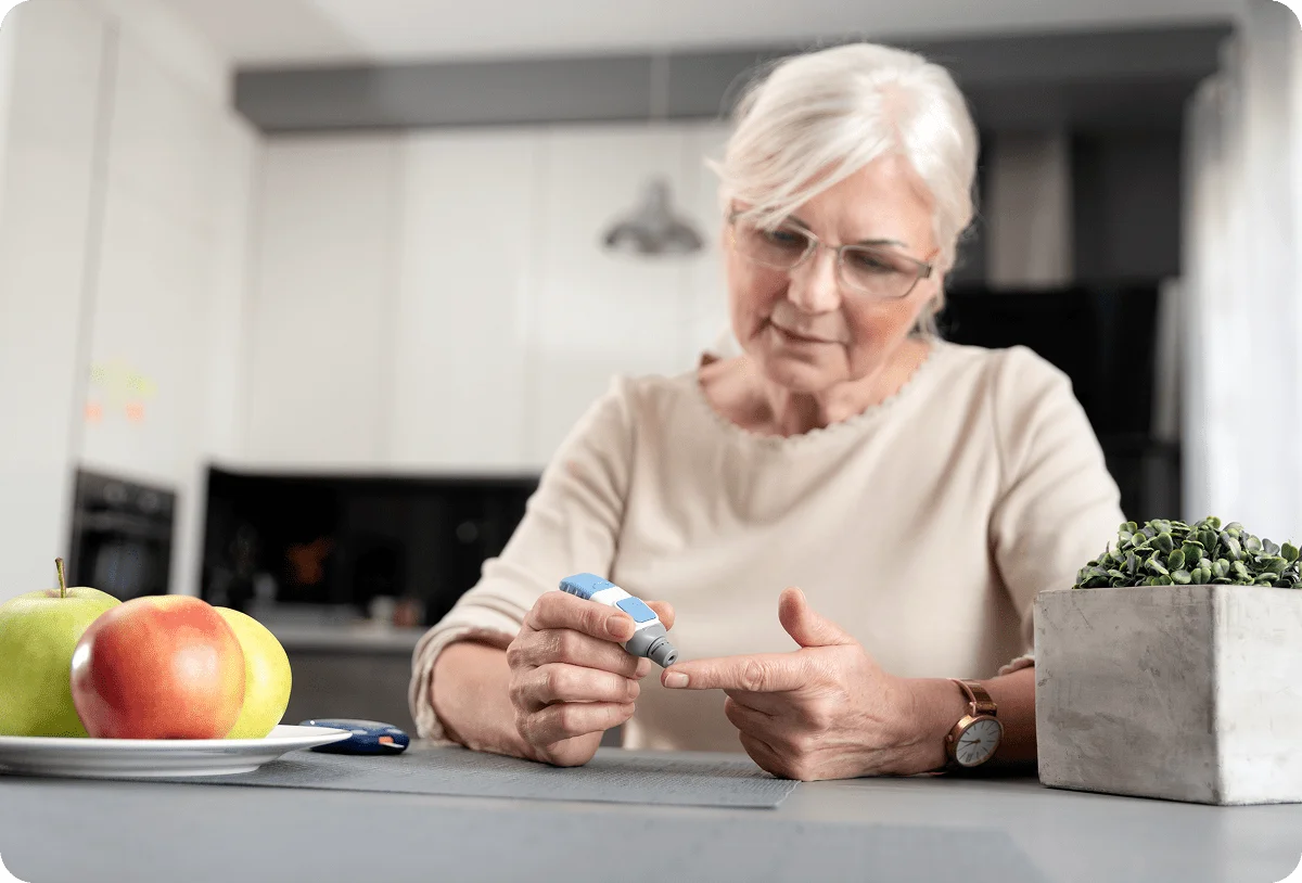 Senior woman recording vitals for RPM